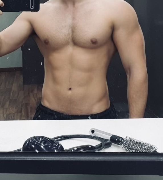 Ken — calm and athletic Japanese therapist, portrait